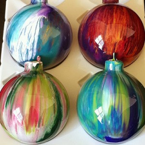 Painted glass ornaments; pour paint inside and swab with cotton ball for this effect! Source: suburbanspunkdesign