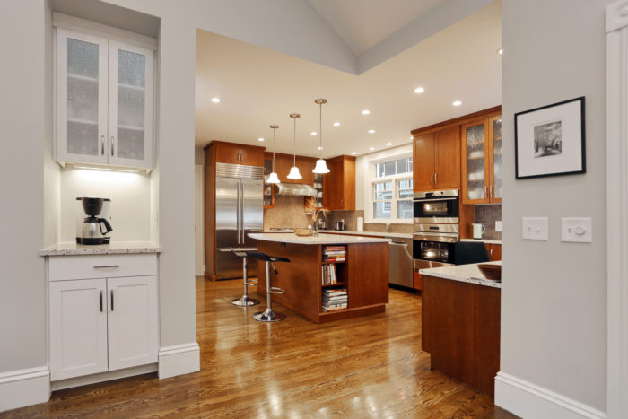 dark wood cabinets in architecturally built kitchen in boston