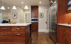 oak wood cabinet in kitchen remodel by new england design & construction