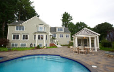 backyard exterior of boston home with in-ground pool and gazebo by nedc