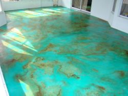 http://etchedinstonedesigns.com/Stained_Concrete.html