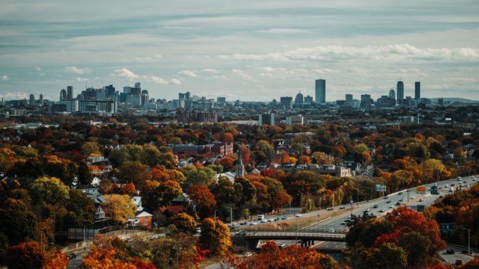 boston fall foliage with city overlooking in the distance