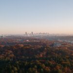 boston skyline with the fall foliage in foreground