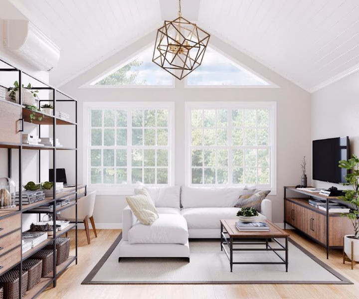 boston home addition sun room with plenty of windows and bookshelf