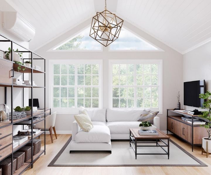 boston home addition sun room with plenty of windows and bookshelf