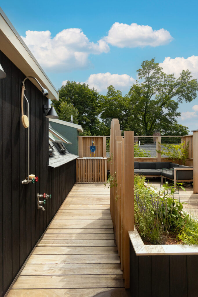 A photo of a roof deck addition in Boston MA